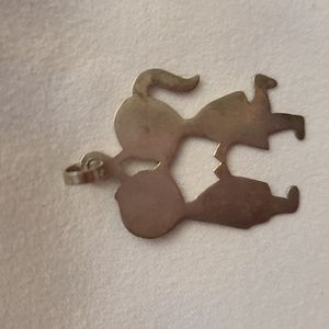 Silver pendant from Peru